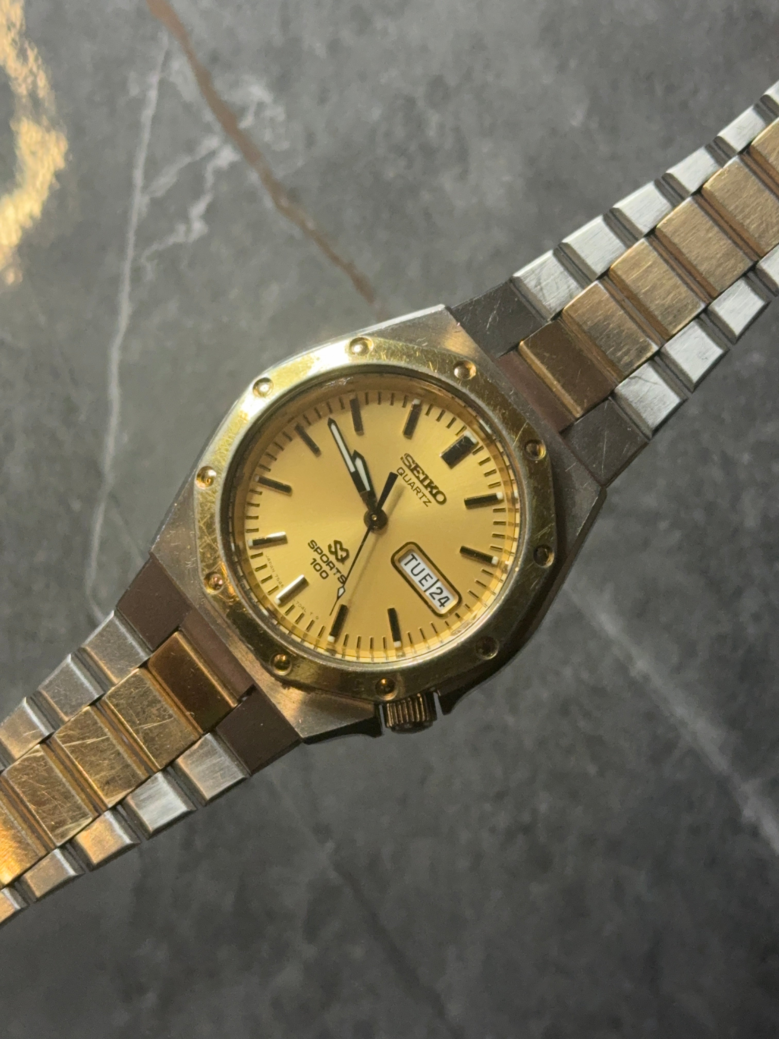 mens bi-metal seiko sq sports 100 royal oak