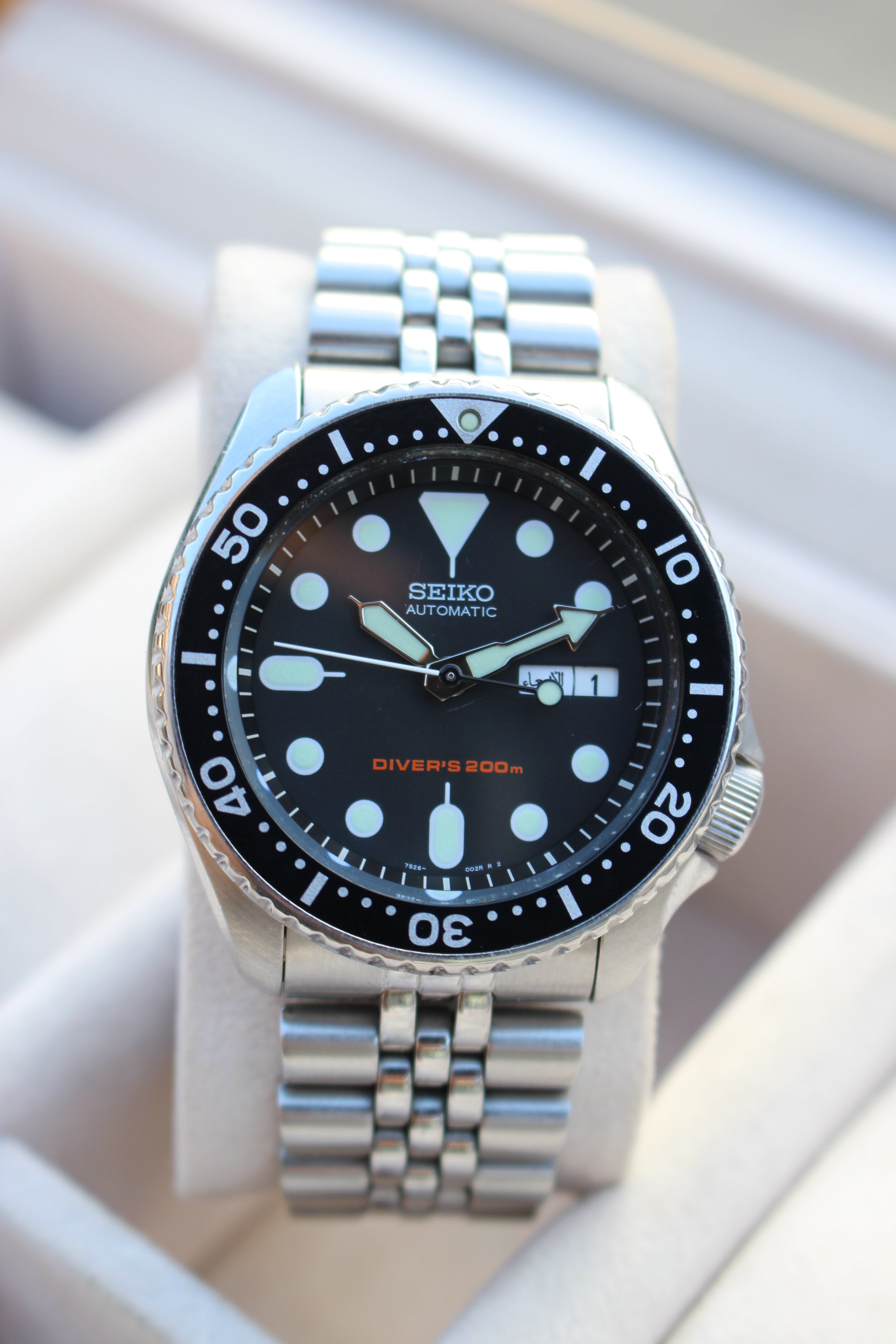 Men’s black dial seiko skx dive watch